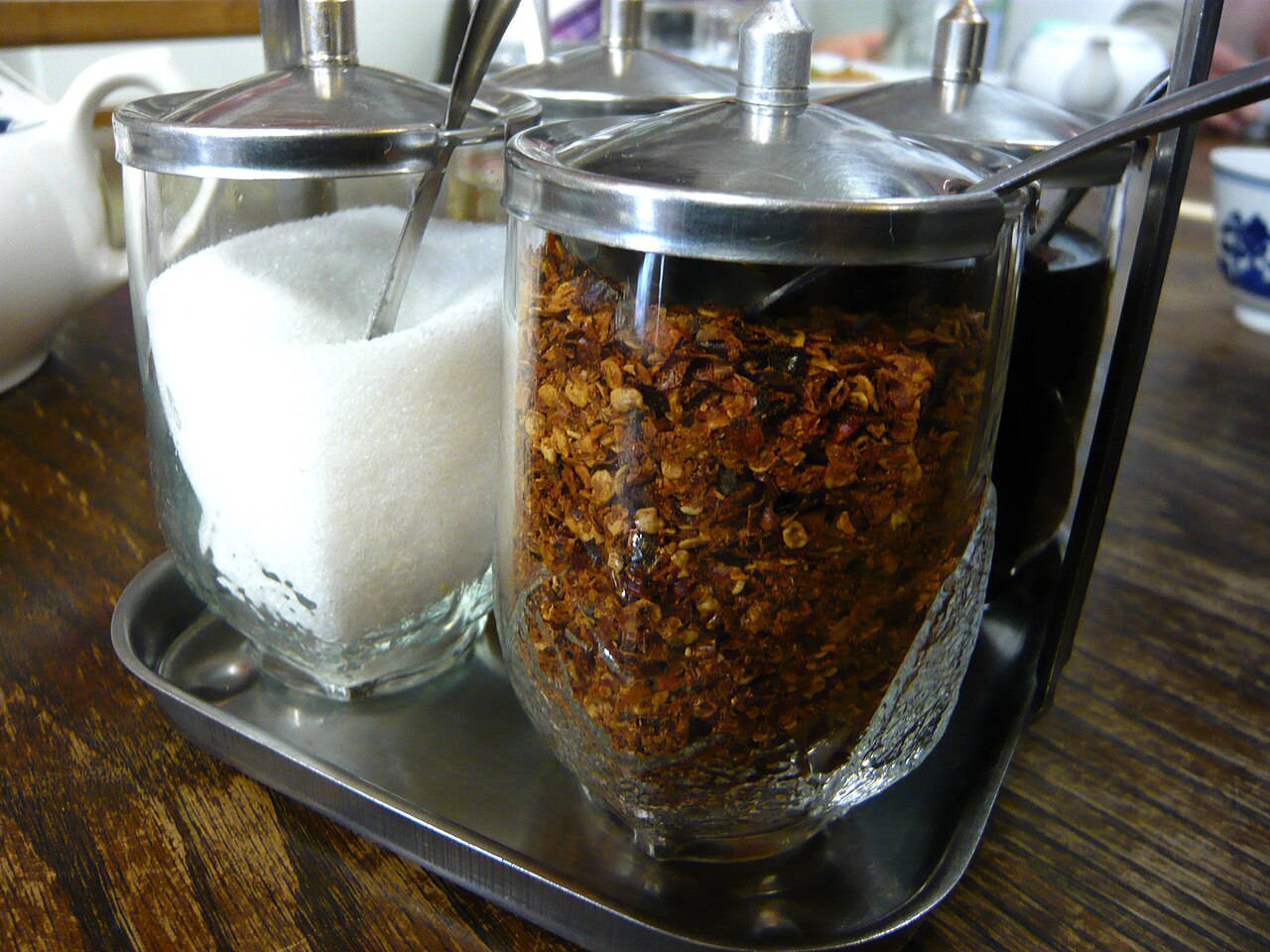 The iconic red chile ristras of Northern New Mexico—strands of dried chiles hung to cure and age.